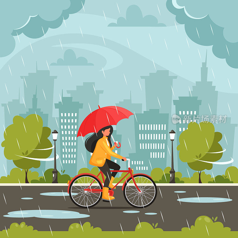 Woman riding bike under an umbrella during the rain. Fall rain. Autumn outdoor activities.